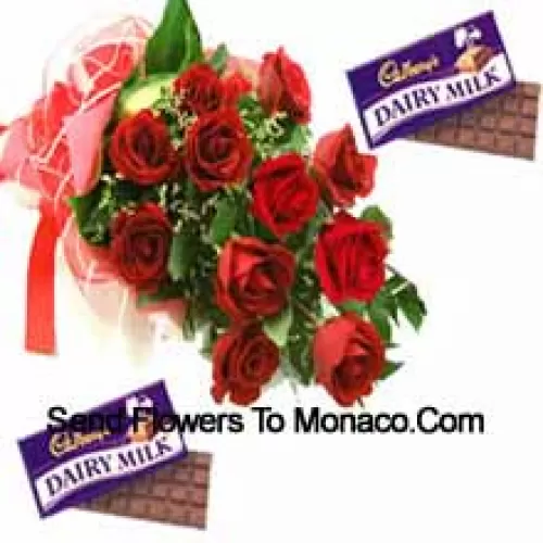 Ramo de 11 rosas rojas con relleno de temporada junto con chocolates surtidos Cadbury