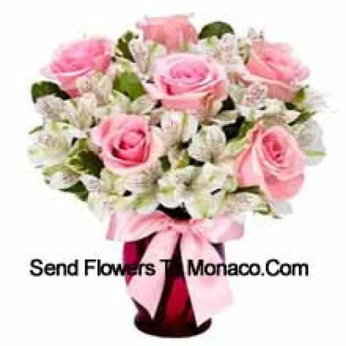 Pink Roses And White Alstroemeria Arrannged Beautifully In A Glass Vase