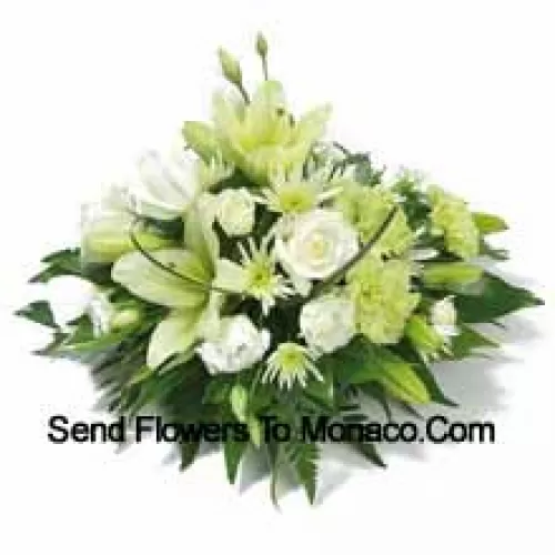 A Beautiful Arrangement Of White Roses, White Carnations, White Lilies And Assorted White Flowers With Seasonal Fillers