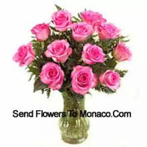 11 Pink Roses With Some Ferns In A Vase