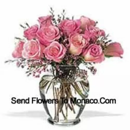 Bunch Of 11 Pink Roses With Some Ferns In A Vase