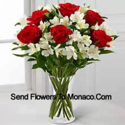 7 Red Roses With Assorted White Flowers And Fillers In A Glass Vase