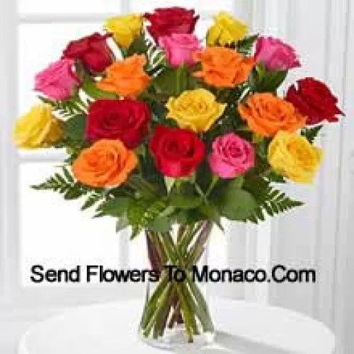 19 Mixed Colored Roses With Seasonal Fillers In A Glass Vase