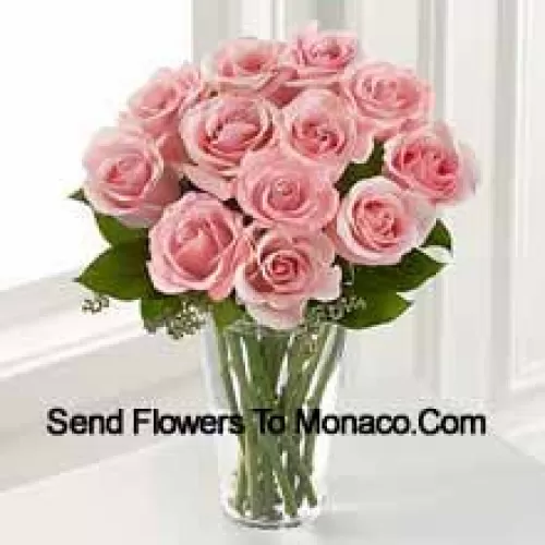 11 Pink Roses With Some Ferns In A Vase