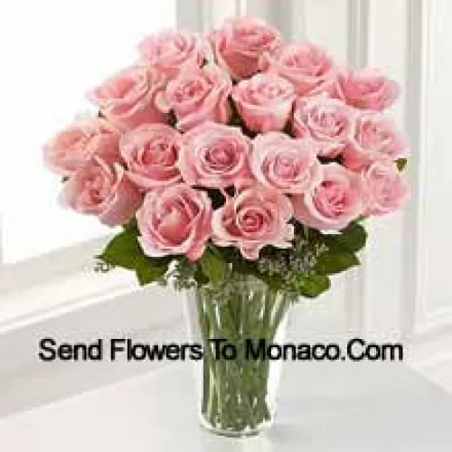 19 Pink Roses With Some Ferns In A Vase