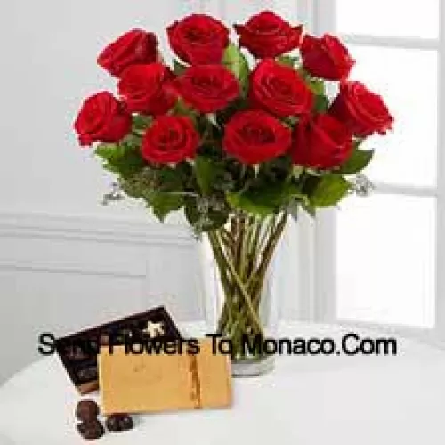 11 Rosas Vermelhas com Algumas Samambaias em um Vaso e uma Caixa de Chocolates Godiva (Reservamo-nos o direito de substituir os chocolates Godiva por chocolates de valor equivalente em caso deindisponibilidade dos mesmos. Estoque limitado)