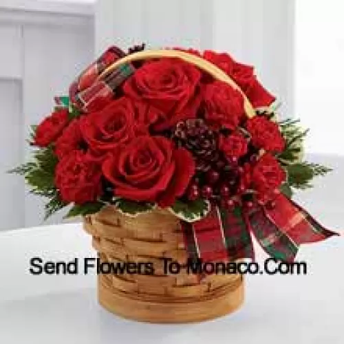 Greet your special recipient with seasonal beauty and blessings. Red roses and mini carnations are gorgeously arranged in a natural woodchip basket with assorted holiday greens, natural pinecones, and berry pics, accented with a tartan plaid ribbon to create a gift that wishes everything this wondrous season has to offer (Please Note That We Reserve The Right To Substitute Any Product With A Suitable Product Of Equal Value In Case Of Non-Availability Of A Certain Product)